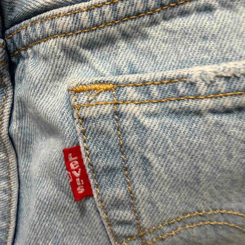 Levi's 501 Original Shorts Size 27 Light Wash Blue High Waisted Raw Hem Denim